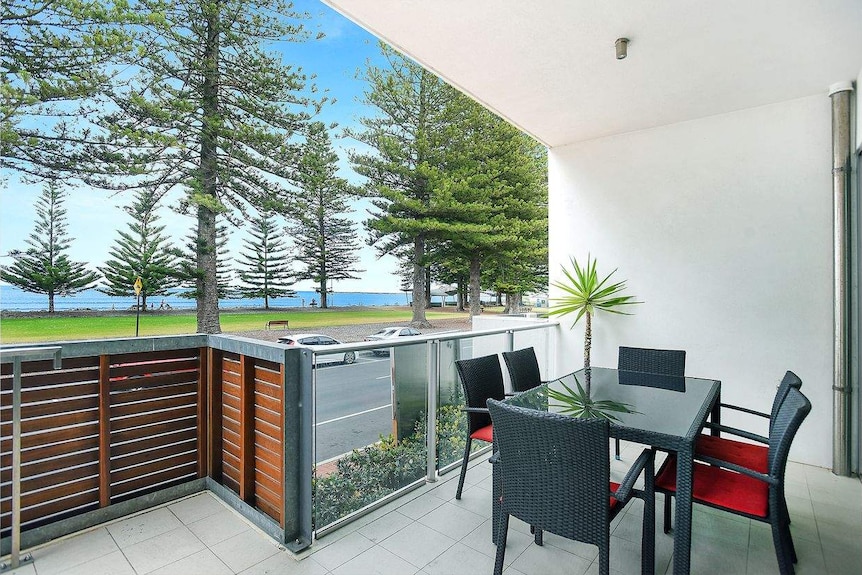 An ocean view from the front of an apartment.