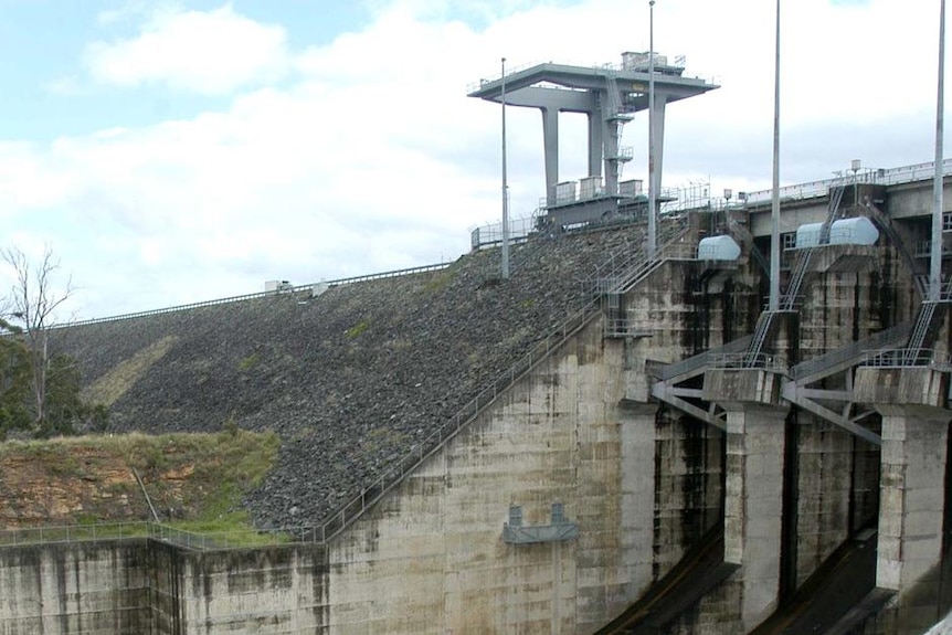 Water pours down the spillway at Wivenhoe Dam