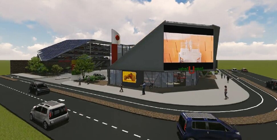 Computer rendering of a station with a huge TV screen and car-stacker