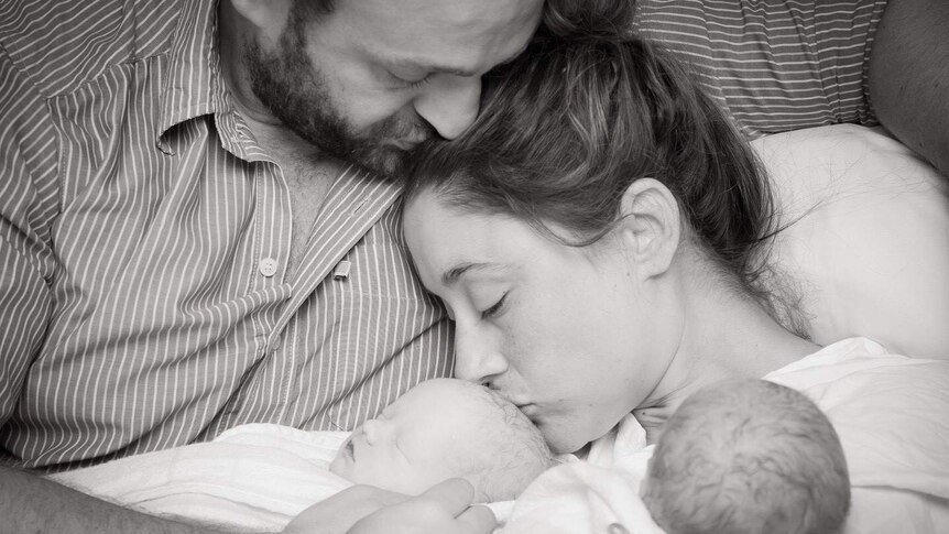Jacqui and Jonnie Hoy hug their stillborn twins, William and Henry