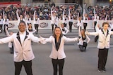 Screenshot of video of young singers bowing after performing in Chicago Thanksgiving Parade