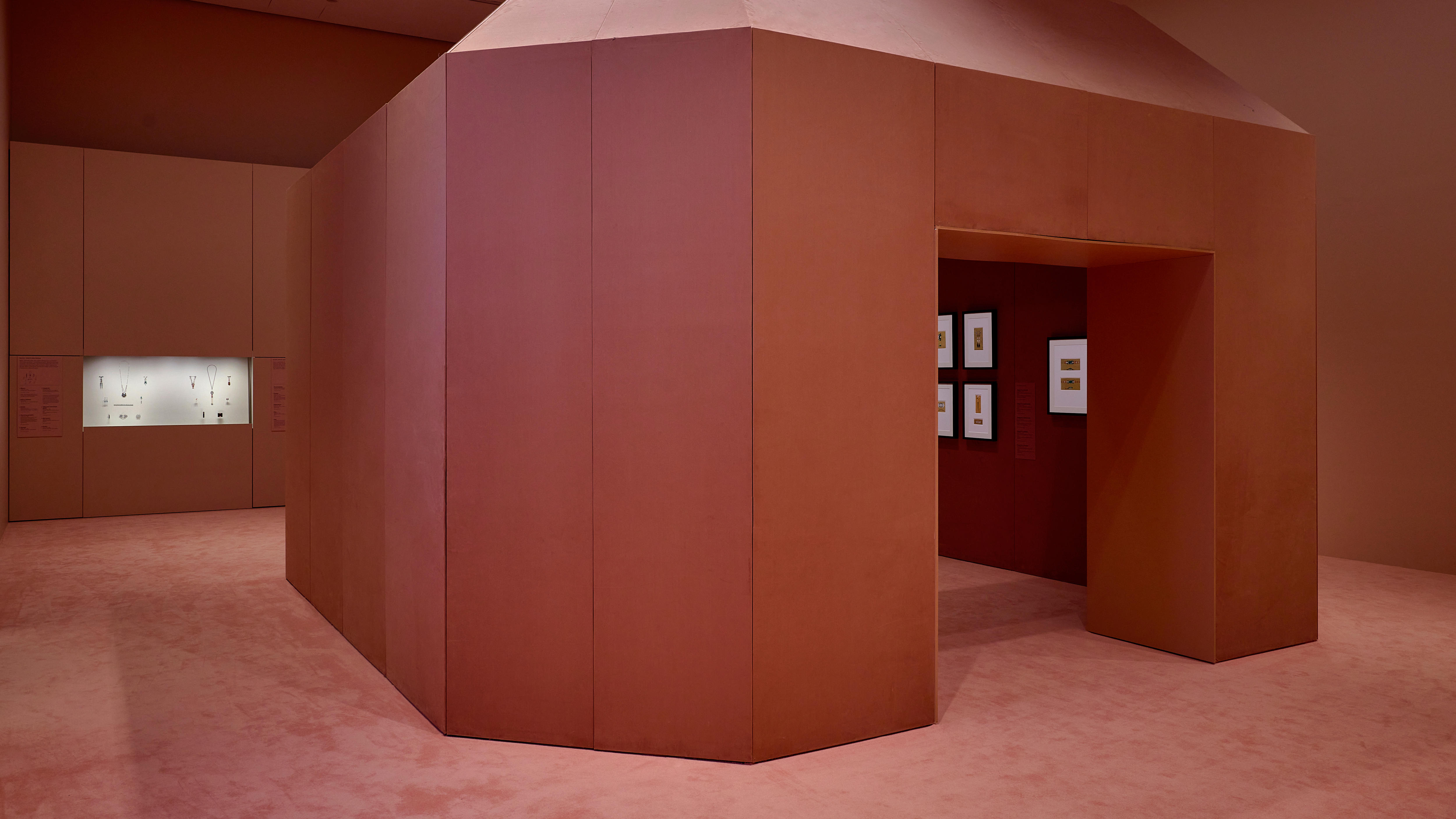 A deep pink coluored part of the NGV's Cartier exhibition
