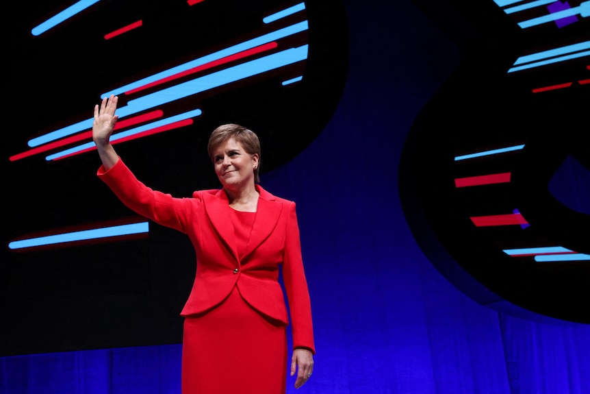Scotland's First Minister Nicola Sturgeon waves.