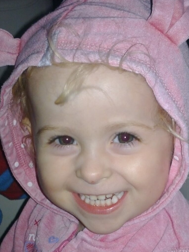 Jasmine Cammilleri, who died after a TV fell on her in Perth in 2013, wears a pink jumper with rabbit ears on the hood.
