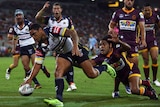 Willie Tonga of the Cowboys scores a try