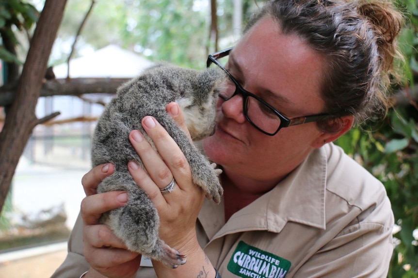Sarah Eccleston assists with the marsupials, including the echidnas at the sanctuary.