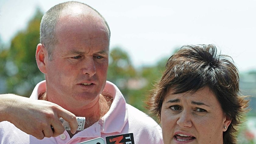 Not over yet: Nigel Brennan's brother Matt and sister-in-law Kellie in Sydney.