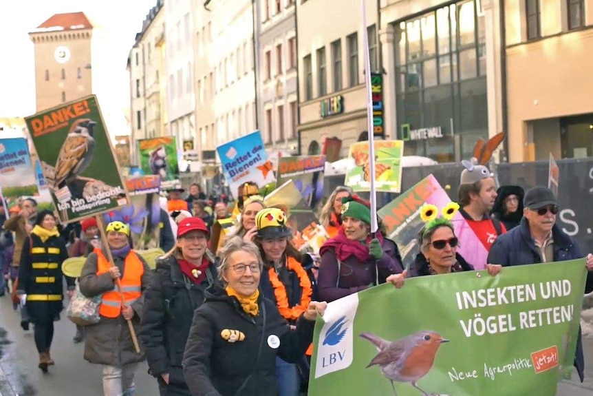 Protesters march in the streets of Munich.