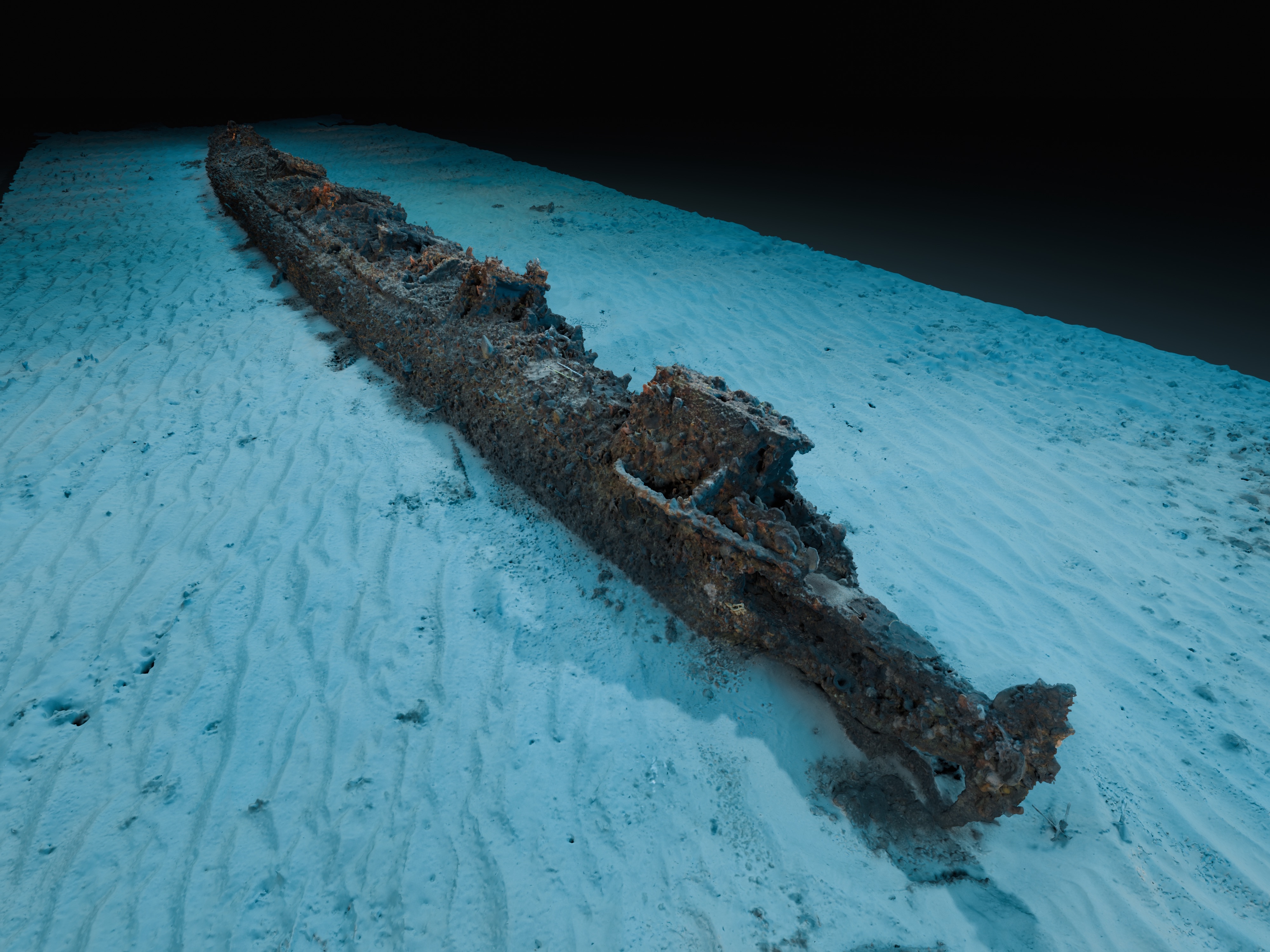 A digital image of the hull of a boat laying on the sea floor
