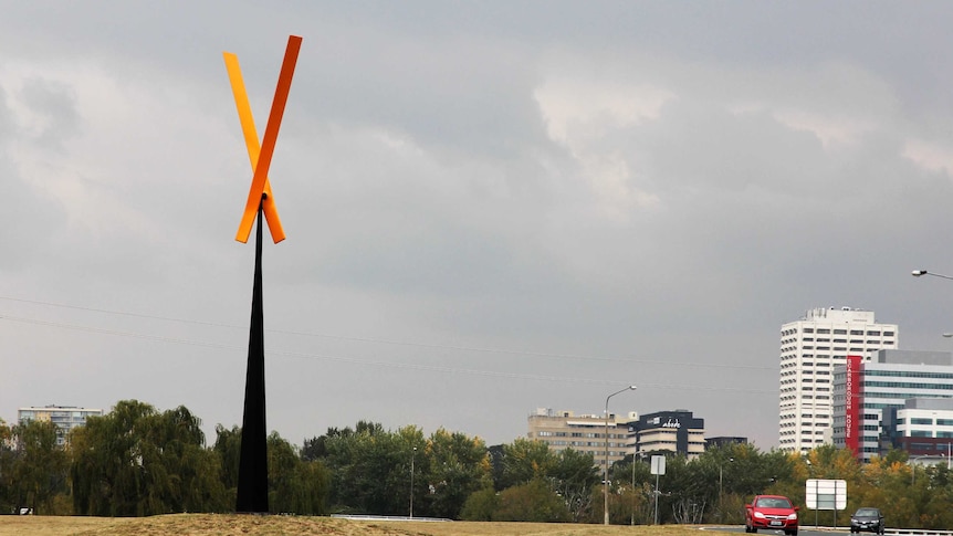 Prominent 11 metre tall wind-activated kinetic sculpture, Dinornis Maximus.