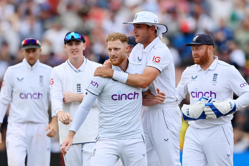 Ben Stokes gets hugged by Stuart Broad