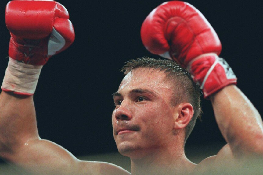 Australian boxing champion Kostya Tszyu celebrates another victory.