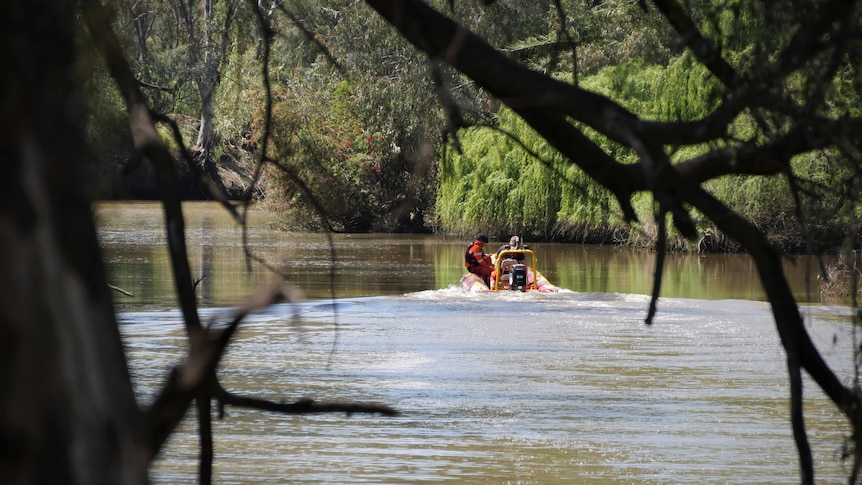 SES boat down river