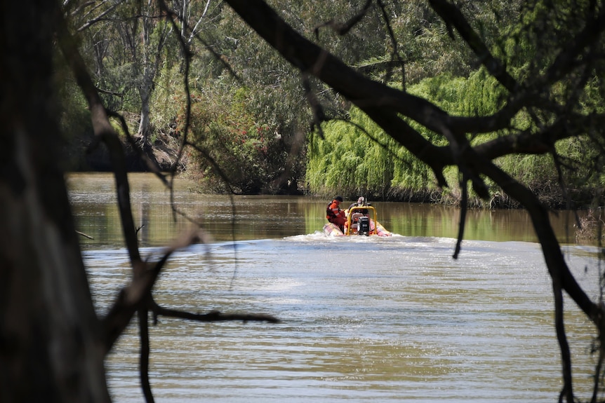 SES boat down river