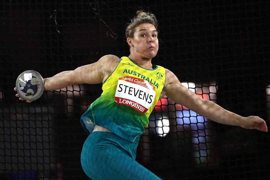 Dani Stevens mid throw in the discus.