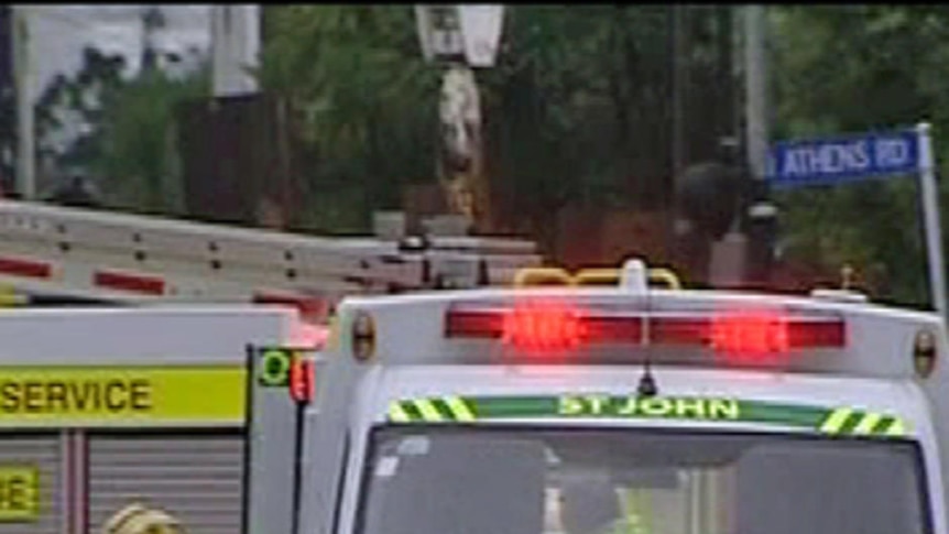 Paramedics and firefighters attend the explosion scene