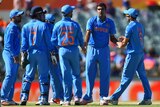 India's Ravichandran Ashwin takes a wicket against UAE in their Cricket World Cup game in Perth.