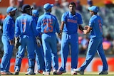 India's Ravichandran Ashwin takes a wicket against UAE in their Cricket World Cup game in Perth.