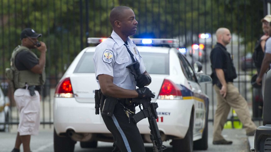 A police officer outside the scene of a shooting at the Washington DC navy yard