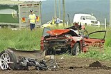 The car and semi-trailer collided head-on.