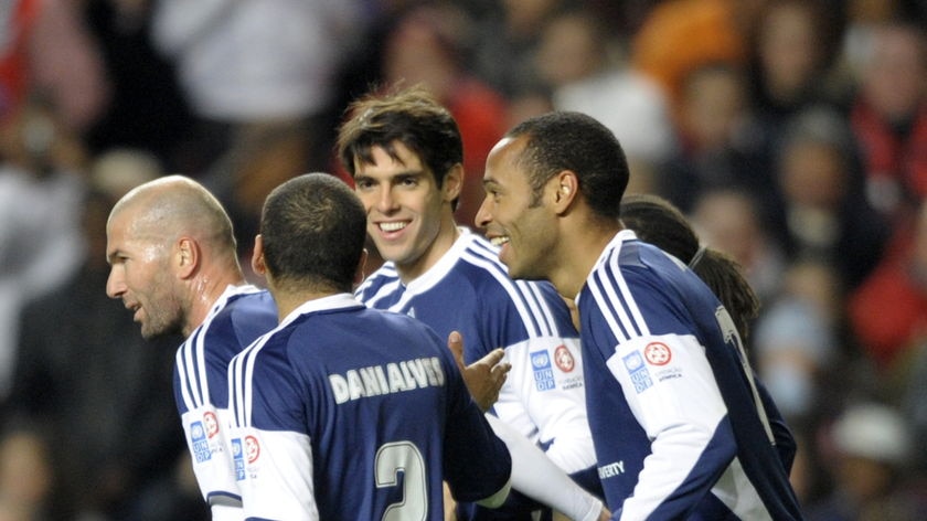 On target: Kaka celebrates with some high-profile friends.