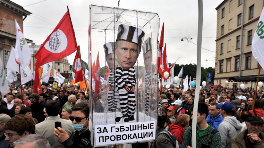 Russian opposition activists demonstrate against Vladimir Putin in Saint Petersburg.