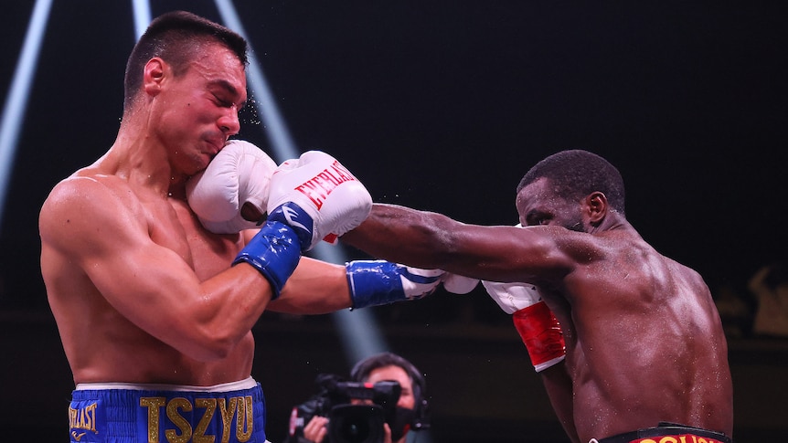 Tim Tszyu is punched in the head