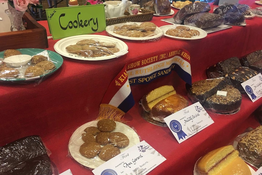 Biscuits sit wrapped on plates on the cookery stand at Kiama Show in 2019