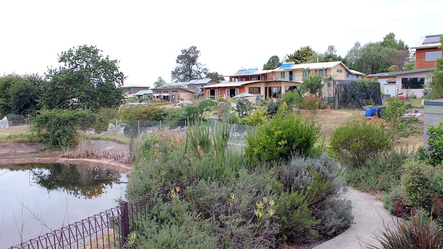 Bend eco-neighbourhood houses overlooking permaculture gardens