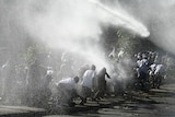 Police use teargas and water cannons in Kenya.