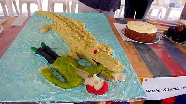 A spokesman for Senator Scullion denies the cake depicts Ms Gillard being eaten.