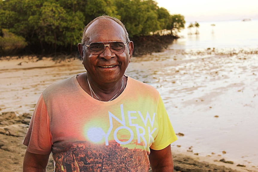 Aboriginal Elder mark DeVow in the sunset on Orpheus island.