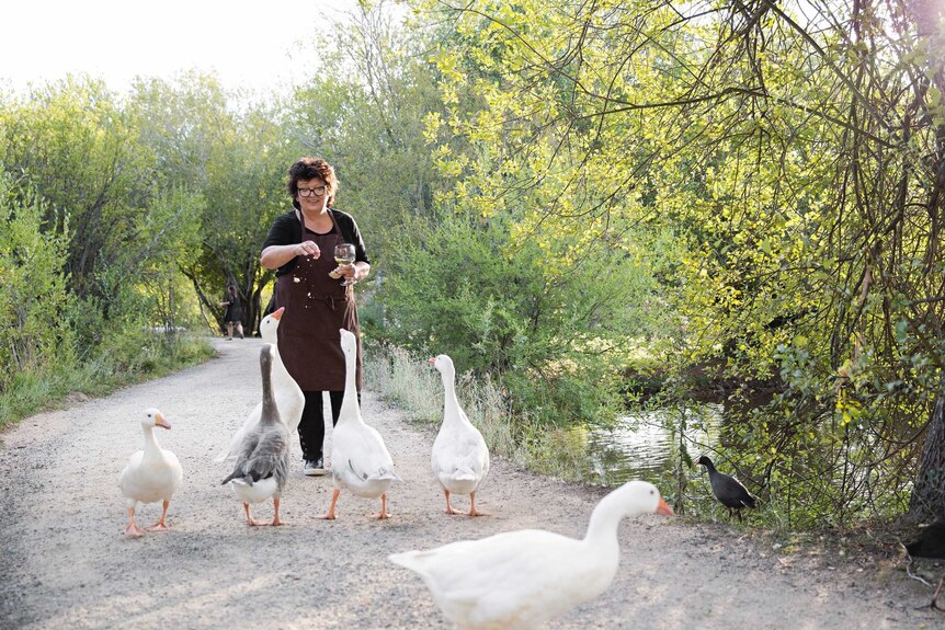 Lake House culinary director Alla Wolf-Tasker feeds the Lake Daylesford geese