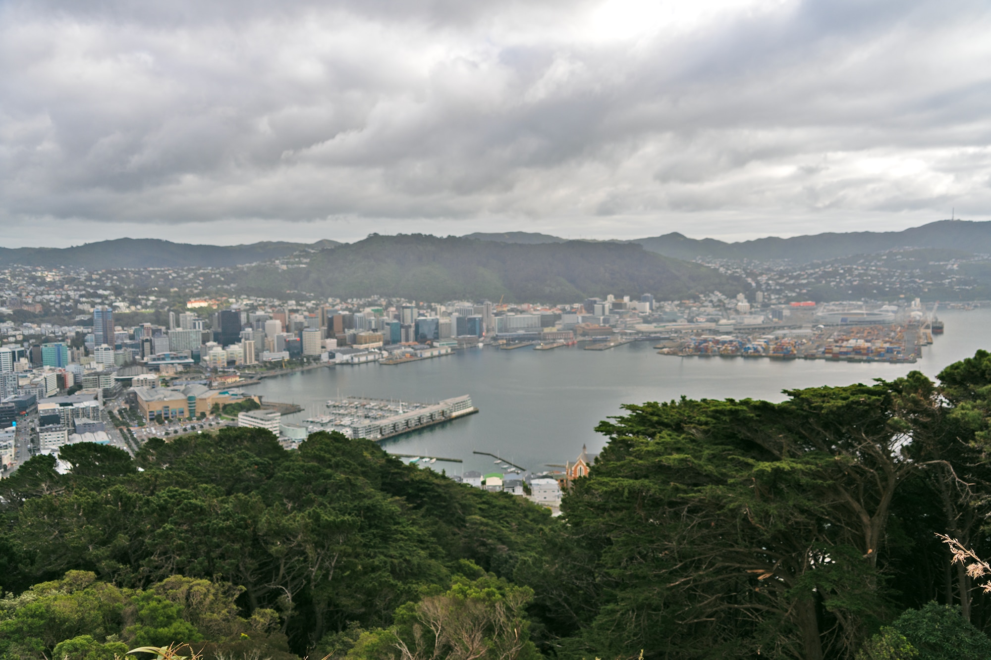A landscape featuring a body of water and harbor.