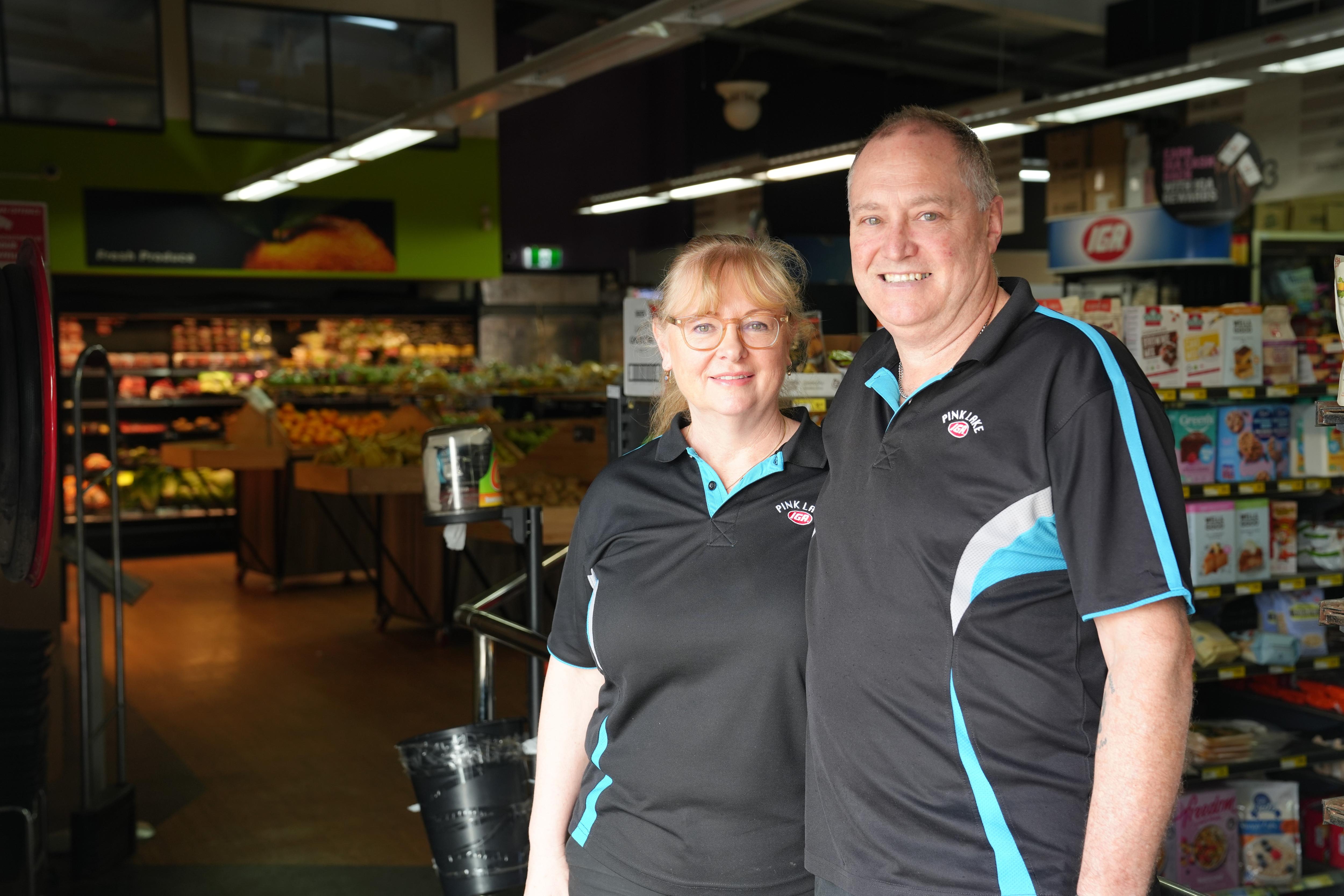 The pair pictured just inside the doorway, in front of the fresh produce section