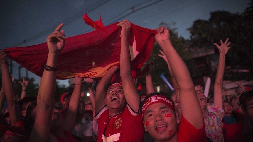 Supporters of Myanmar opposition leader Aung San Suu Kyi