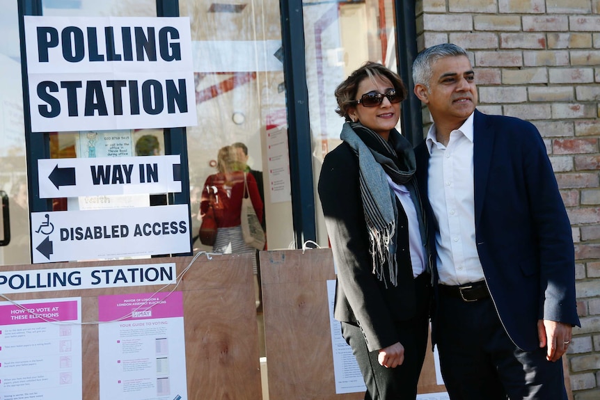 Sadiq Khan, Britain's Labour Party candidate for Mayor of London, and his wife Saadiya at a polling station.