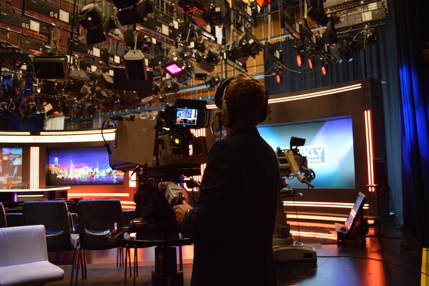 A production team films on set for The Weekly at Ripponlea studio 31.