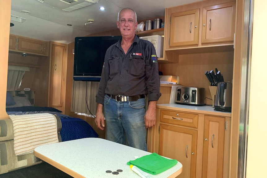 Trevor Abela inside his caravan.