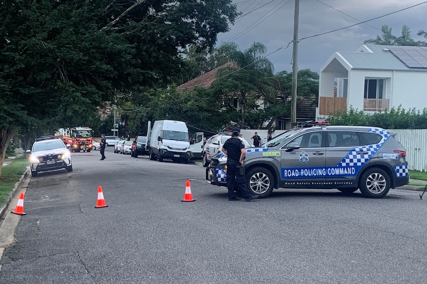 Police cordon off a street at Wooloowin in Brisbane's inner-north