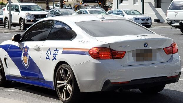 A car with what appears to be Chinese police markings parked in Adelaide.