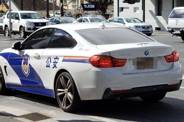 A car with what appears to be Chinese police markings parked in Adelaide.