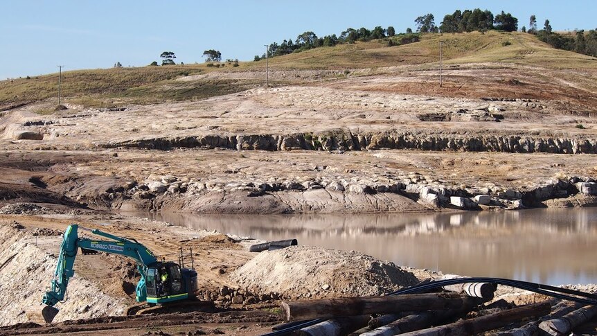 Tractor on Pasminco smelter site under remediation, with Munibung Hill in the background, in Boolaroo Lake Macquarie.