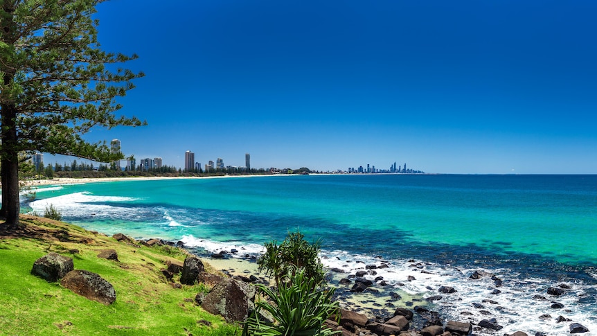 Gold Coast beach with the high rise skyline in the background.