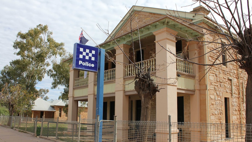 A man was tasered in the Wilcannia police station after allegedly assaulting two officers.