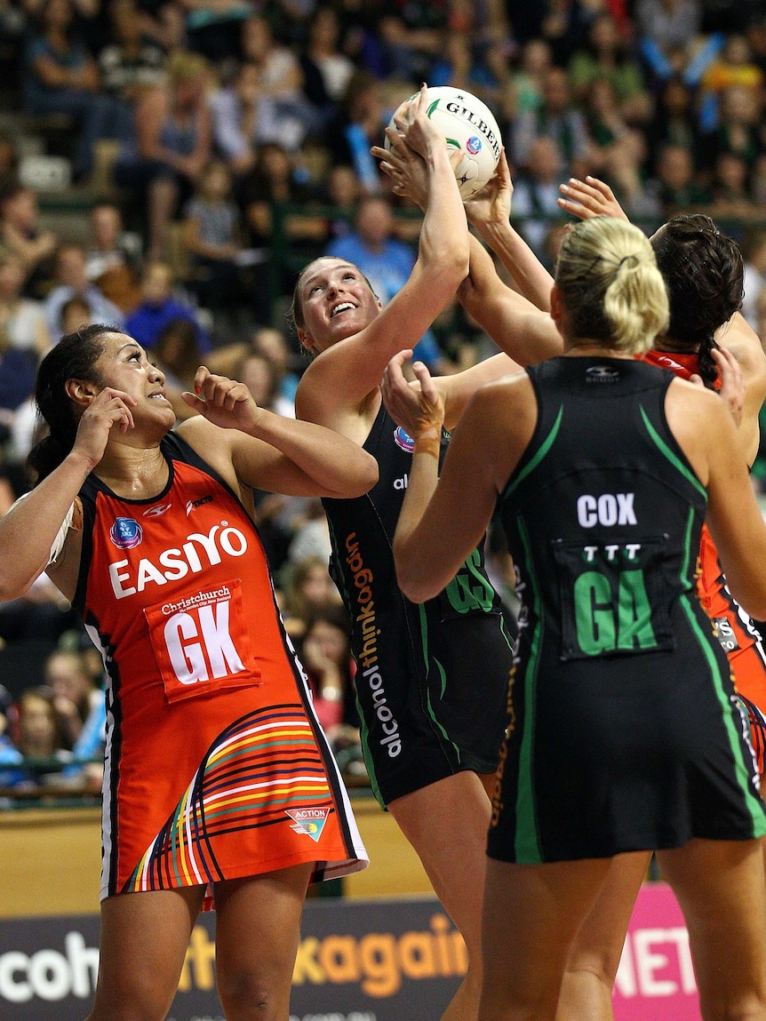 Caitlin Bassett catches the ball for the Fever