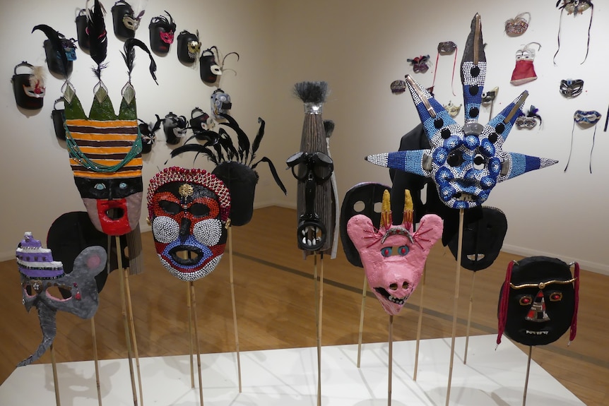 Masks at an art exhibition.