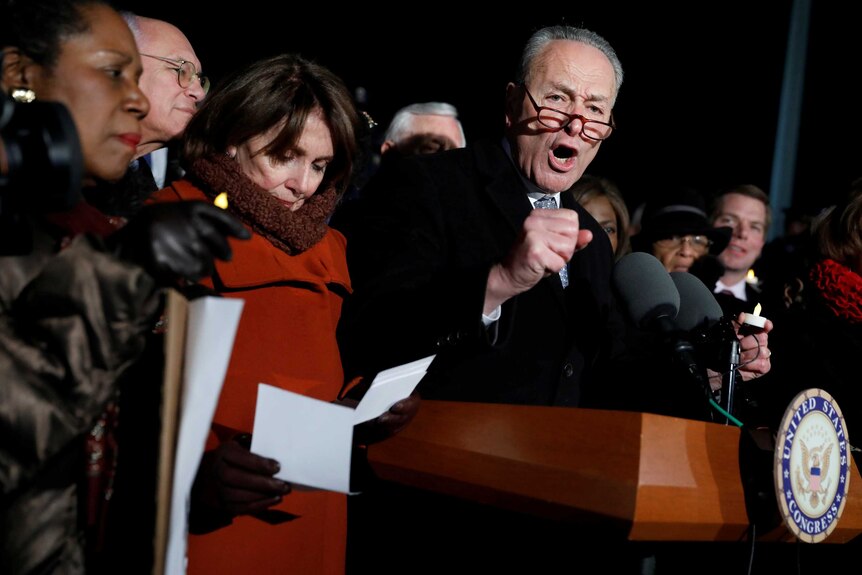 Senate Minority Leader Chuck Schumer (D-NY) speaks during a rally against President Donald Trump's travel ban