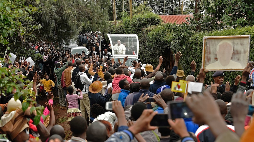 Residents of Kenyan slum welcome Pope Francis.