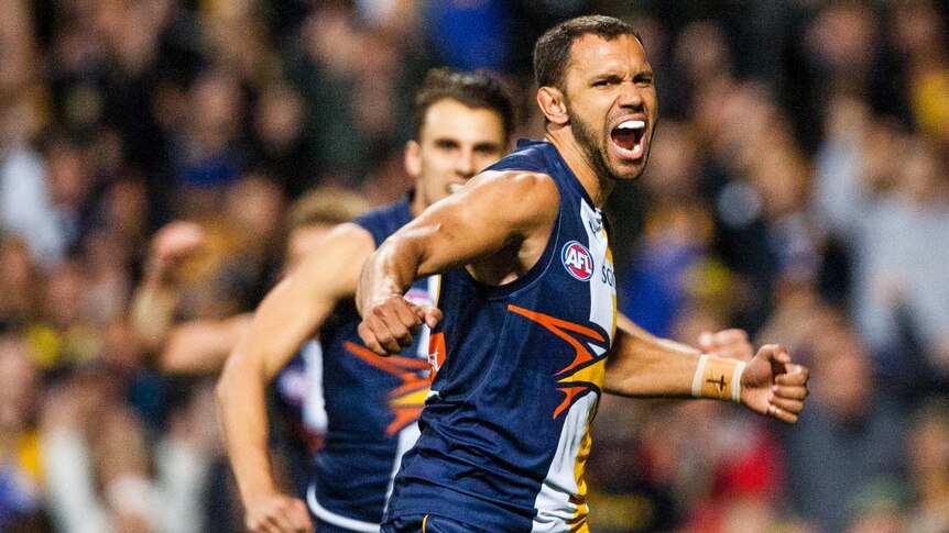 West Coast's Josh Hill celebrates against Hawthorn